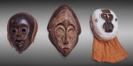 Lote 332: TRES ANTIGUAS MASCARAS DE MADERA TALLADA Y POLICROMADA. TRES ANTIGUAS MASCARAS DE MADERA TALLADA Y POLICROMADA.