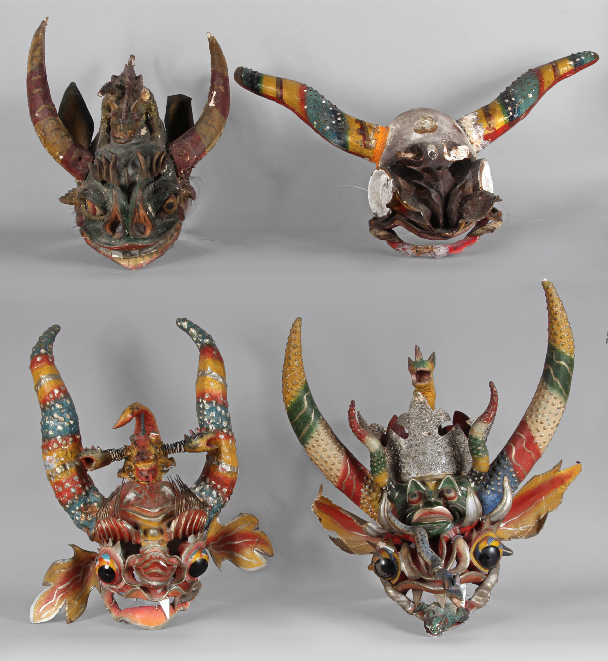  CUATRO ANTIGUAS MASCARAS BOLIVIANAS DE CARNAVAL. 