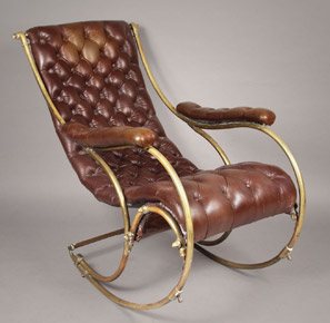Lote 126: SILLON MECEDOR CON ARMAZON DE BRONCE.  SILLON MECEDOR CON ARMAZON DE BRONCE. 